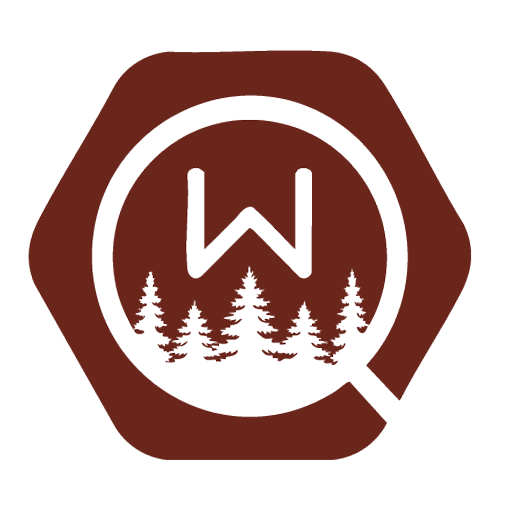 A brown hexagonal logo with a white circle inside, containing the letter "W" above silhouettes of pine trees, resembling a forest scene.